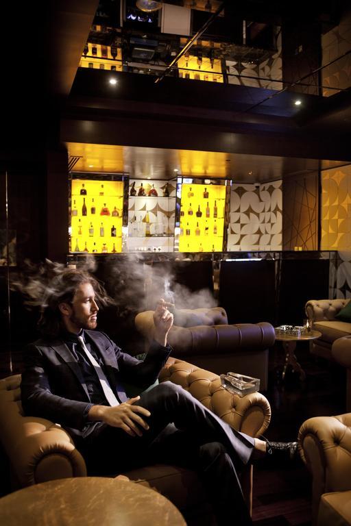 The Domain Bahrain Hotel And Spa - Adults Friendly 16 Years Plus Manama Eksteriør billede A man smoking in a nightclub